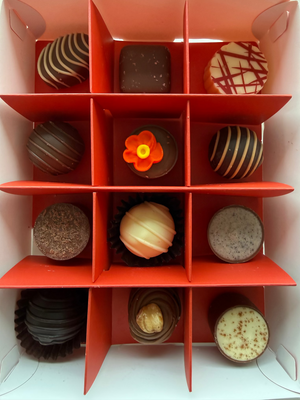 Assorted chocolates in a red Christmas Gift Box